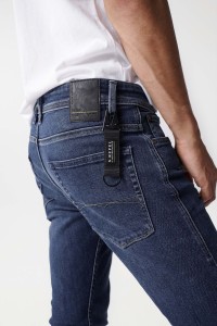 S-REPEL SKINNY JEANS