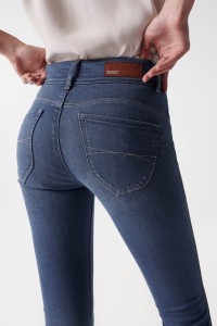 JEAN SECRET PUSH IN EFFET COUTURE A LA JAMBE