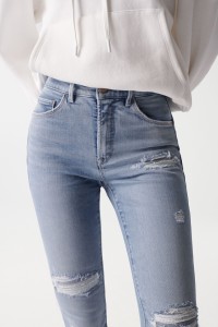 FAITH PUSH IN JEANS WITH RIPS