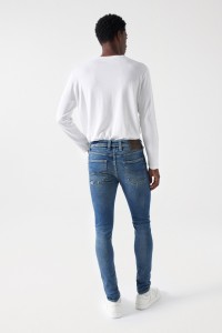 JEAN SKINNY AVEC DCHIRURES ET FERMETURE CLAIR