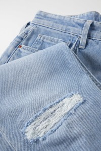 SLIM JEANS WITH RIPS