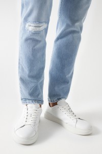 SLIM JEANS WITH RIPS