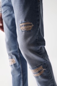 REGULAR JEANS WITH RIPS