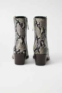 LEATHER ANKLE BOOTS WITH ANIMAL PRINT