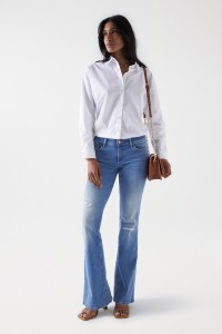 WONDER PUSH UP FLARE JEANS MIT RISSEN