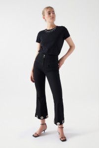 DIVA JEANS WITH GLITTERY EYELETS ON THE HEM