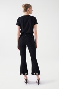 DIVA JEANS WITH GLITTERY EYELETS ON THE HEM