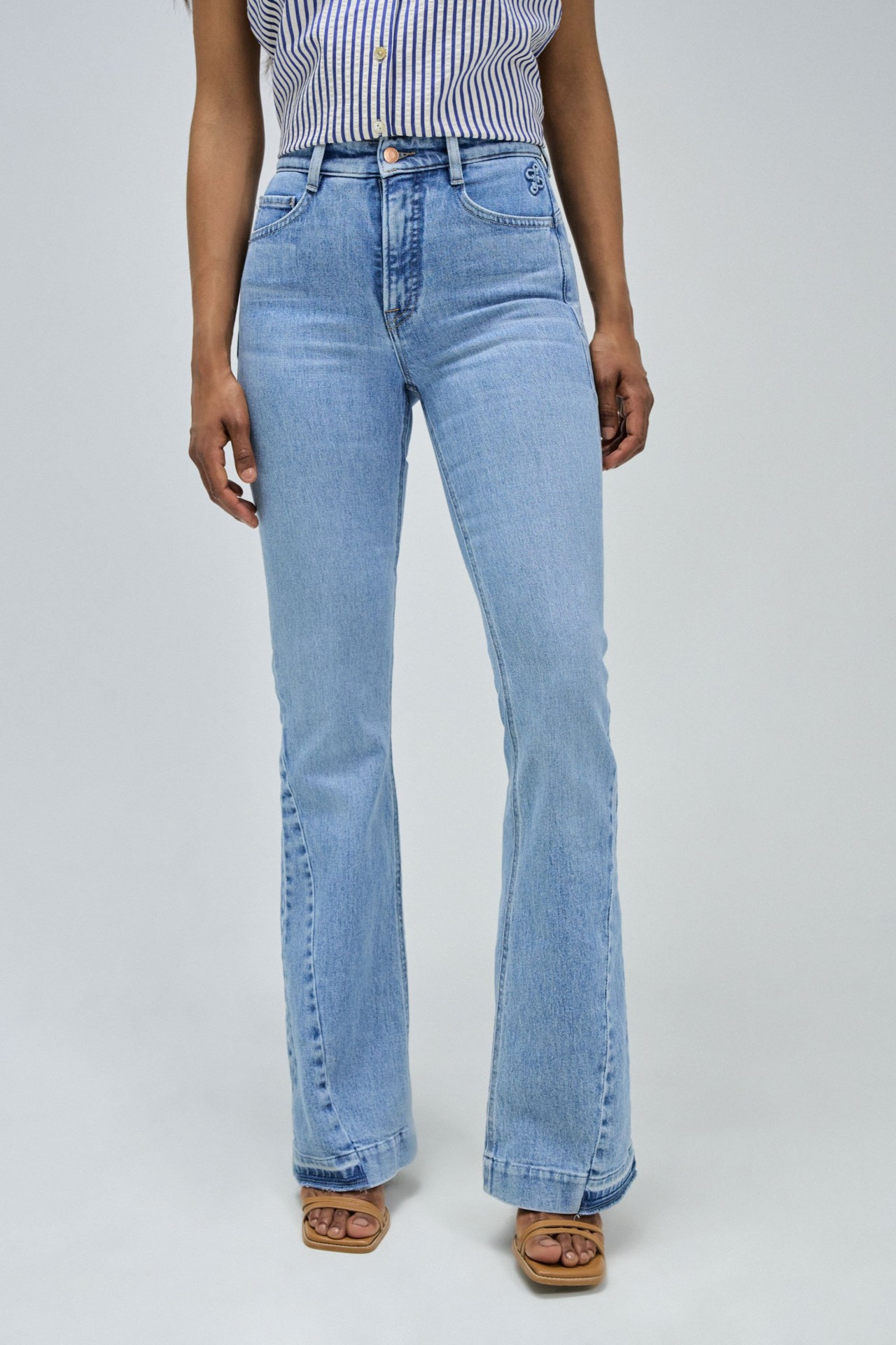 FAITH PUSH IN FLARE JEANS WITH HEM DETAIL