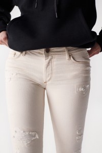 UNBLEACHED WONDER PUSH UP JEANS WITH RIPS