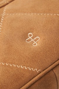 SUEDE BAG WITH METAL LOGO