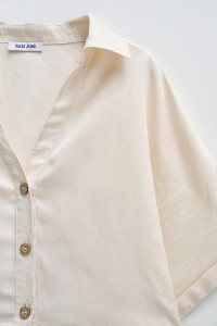 LIGHTDENIM SHIRT WITH BOW AT THE HEM