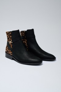 BOTAS ANIMAL PRINT EM PELE